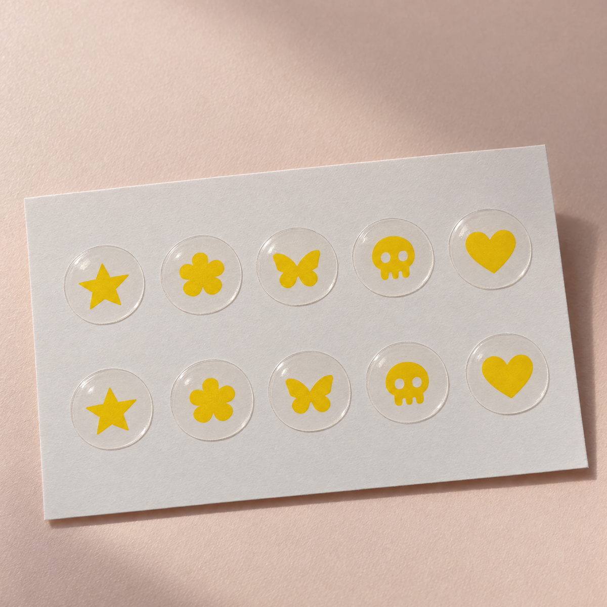 Sheet of 10 yellow HerSafe test stickers