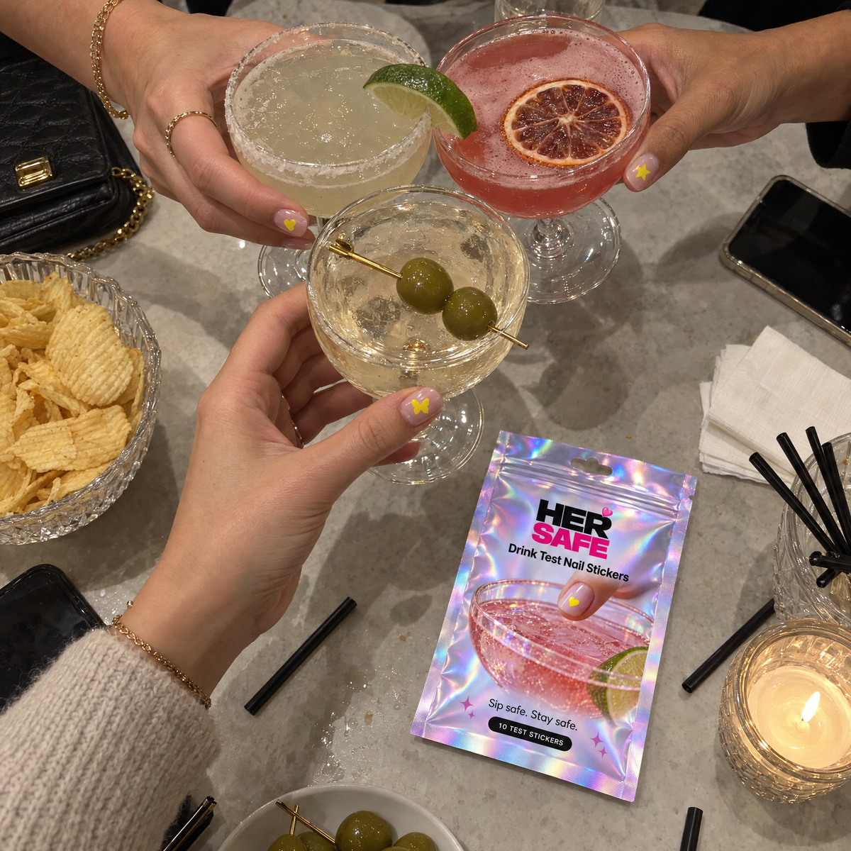 Girls' night out with HerSafe stickers on their nails